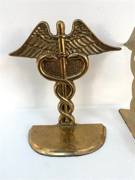 bookends hermes caduceus copper art deco